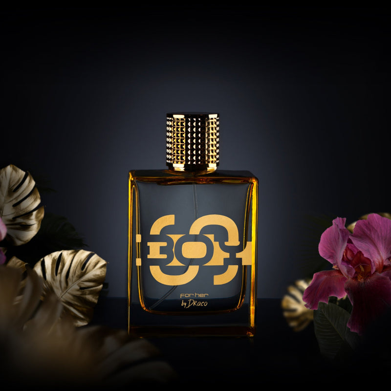 Eau de parfum SBOY For Her. SBOY By Draco fragrance for women from Soulja Boy. Perfume bottle with flowers.